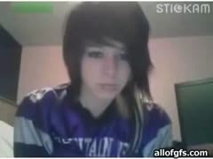 A really attractive playgirl shows off her attractive body parts on camera while wearing a large t-shirt.